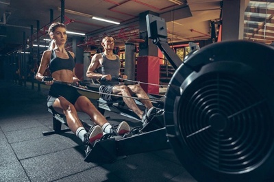 Beautiful Young Sporty Couple Workout Gym Together