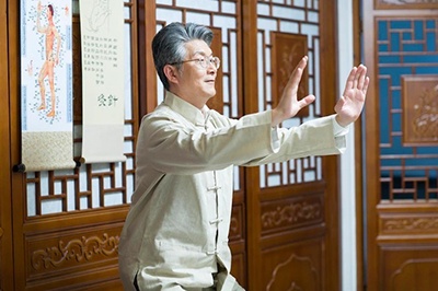 Senior Man Practicing tai  chi