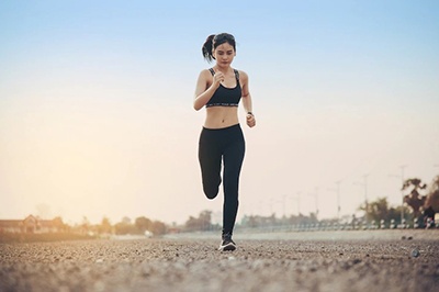 Young Fitness Woman Runner
